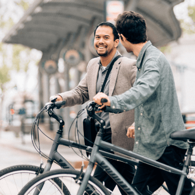 Portable contents insurance – two men standing with their bicycles